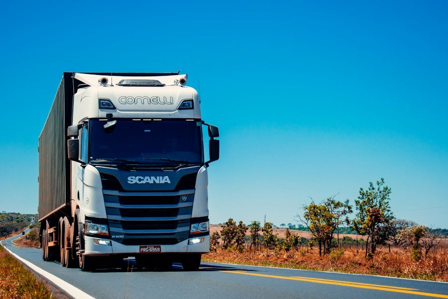 Commercial semi truck hauling freight on interstate highway